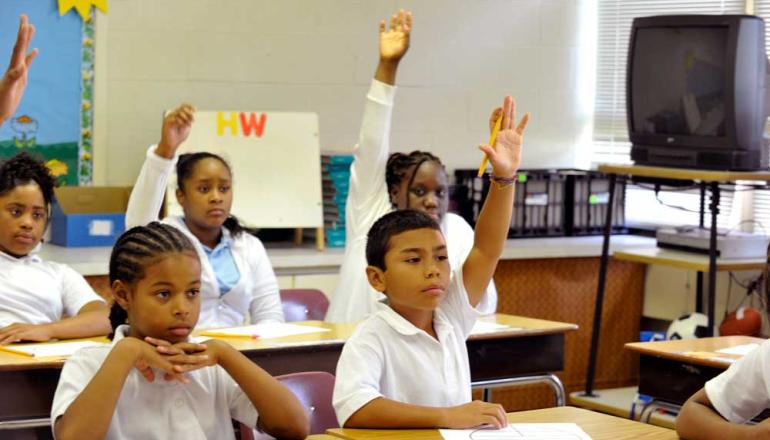 Students with raised hands